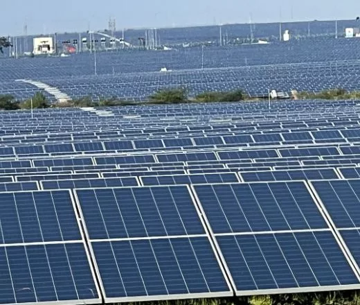 Land filled with number of Solar Panels on the ground